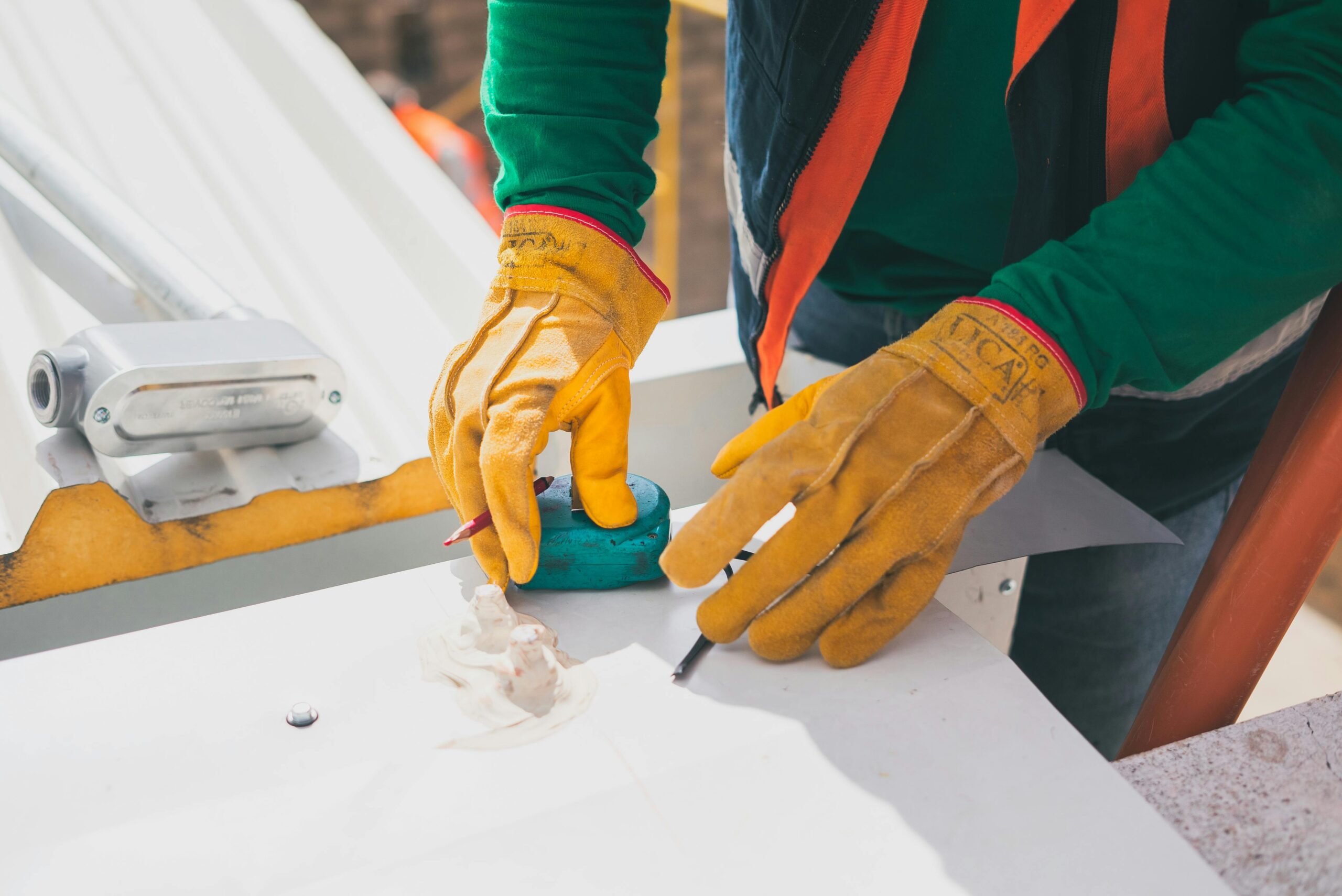 A professional roofer handling a commercial roof inspection