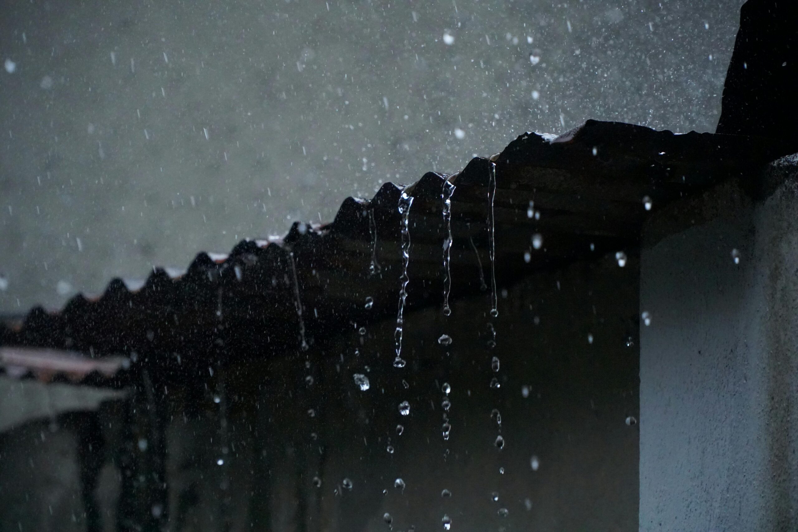 A commercial roofing system in Atlanta covered with water