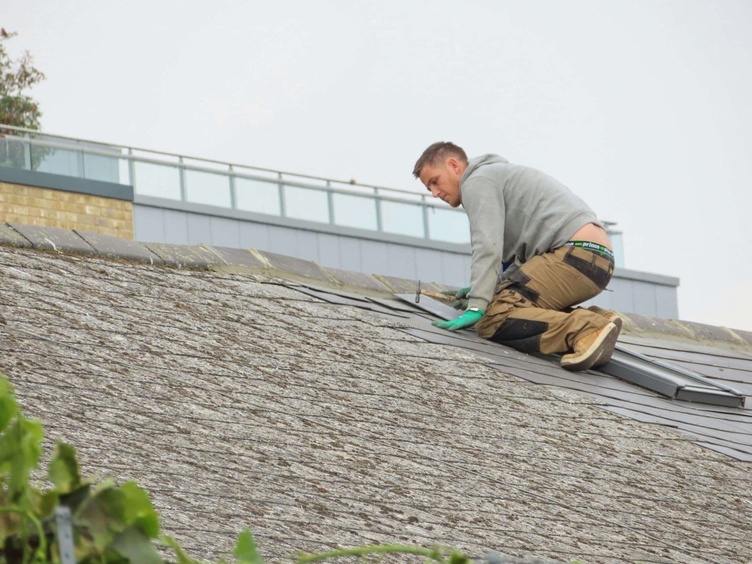 A commercial roofer maintaining a roof in Atlanta