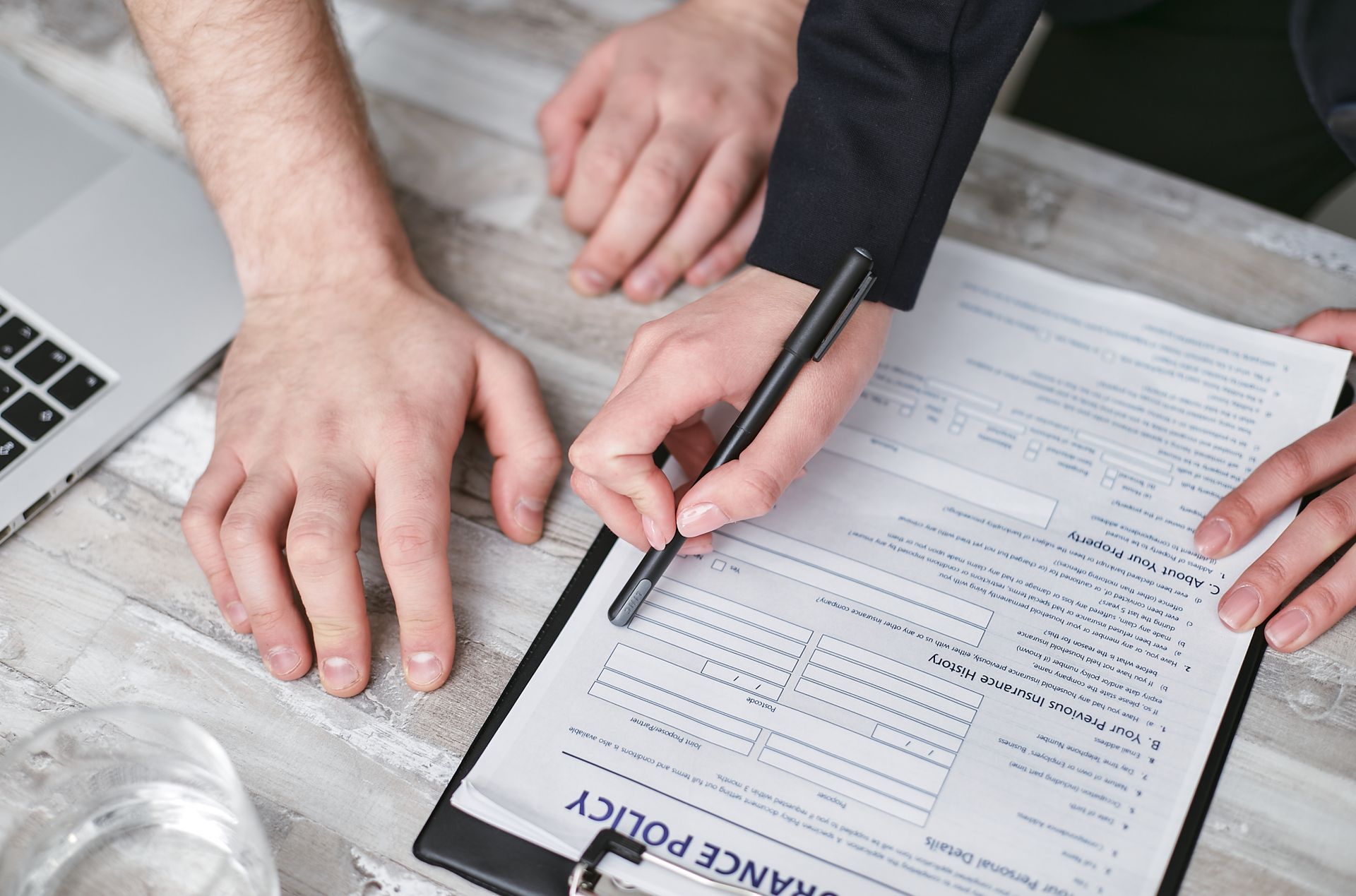 pexels-mikhail-nilov-7734574 Two people handling an insurance claim for a roofing system in Atlanta