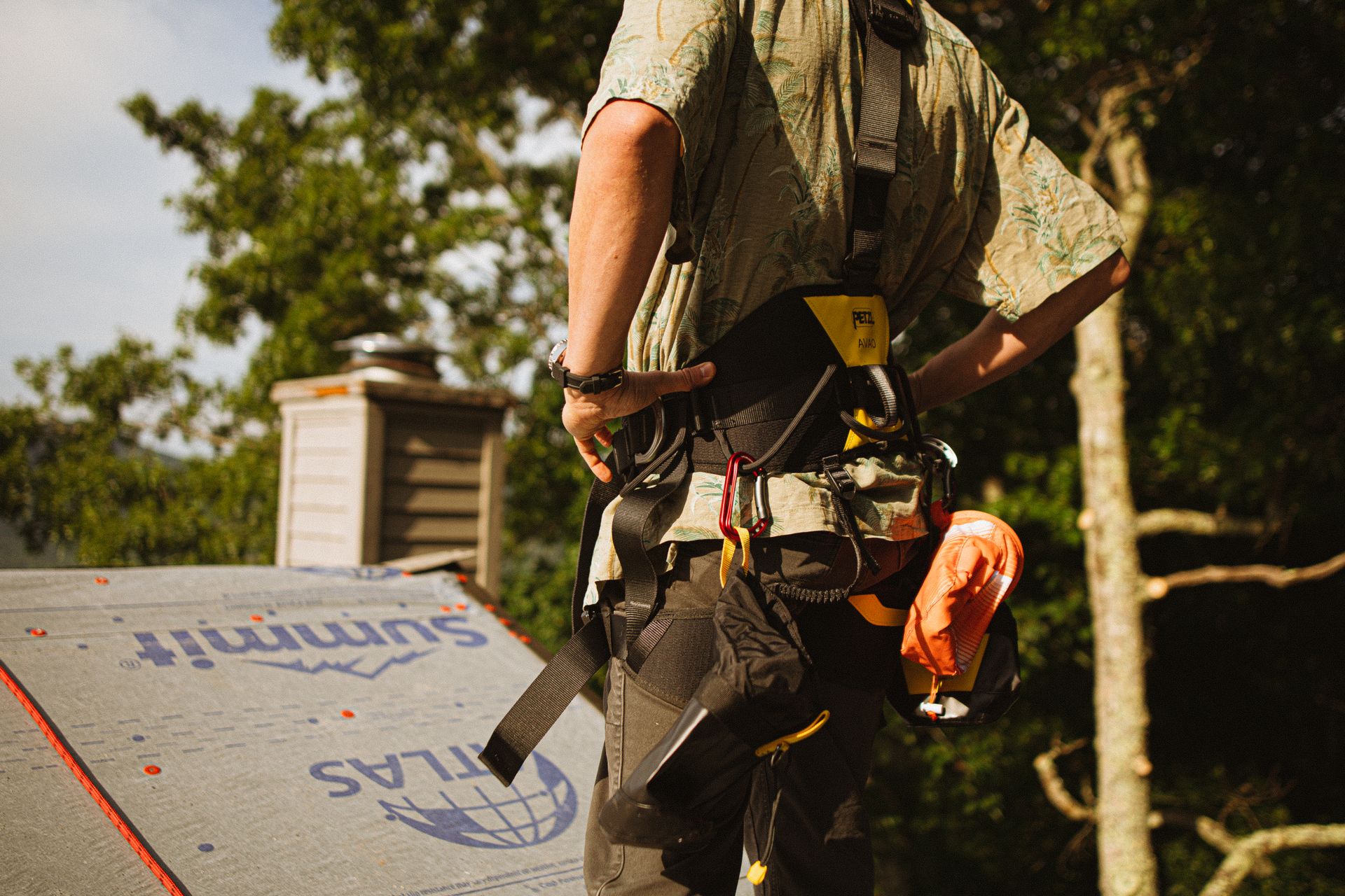 A roofing contractor working on a roof in Atlanta